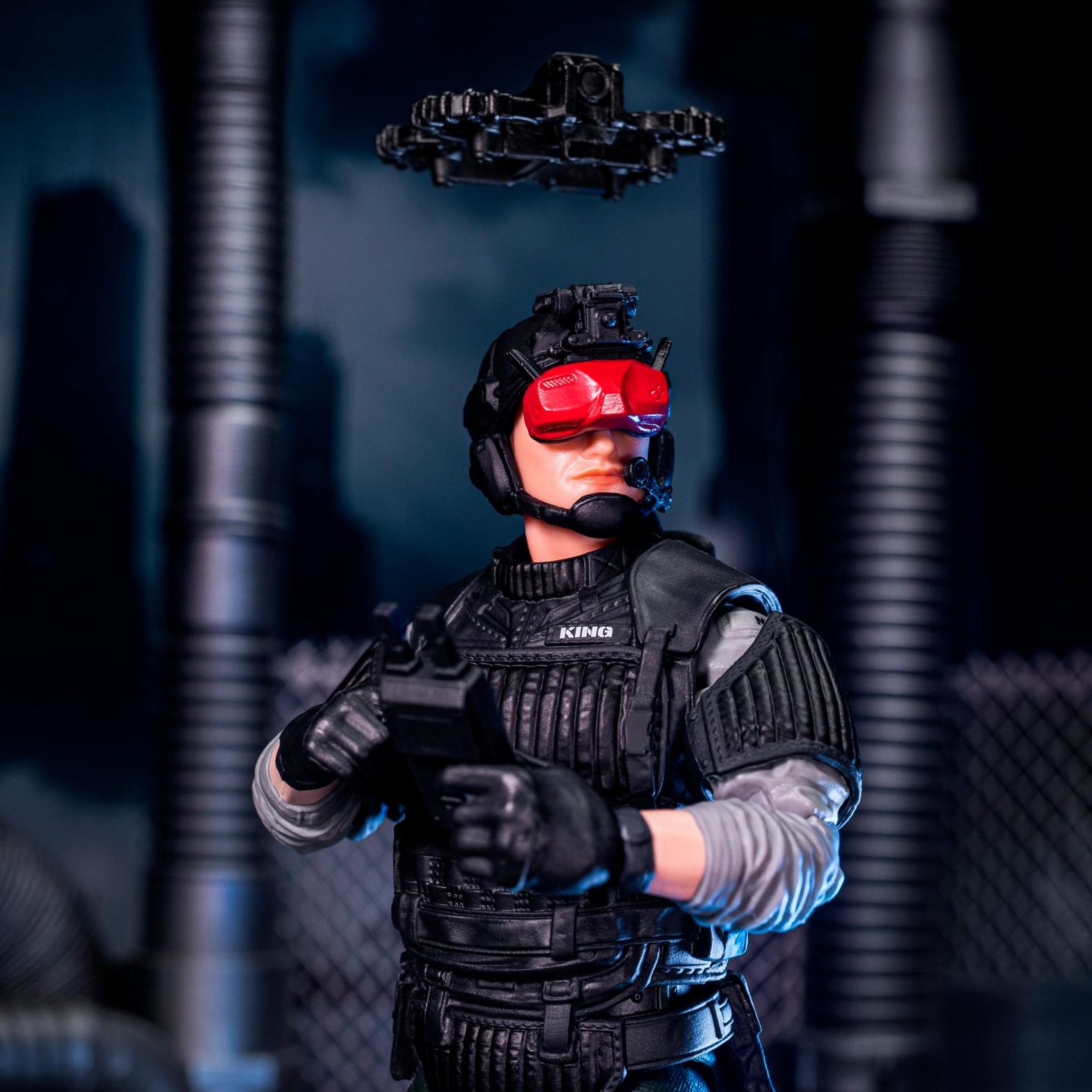 Night Force Sneak Peek with tactical helmet and red night vision goggles